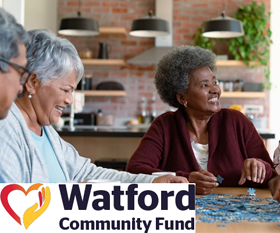 Residents enjoying a chat around a table