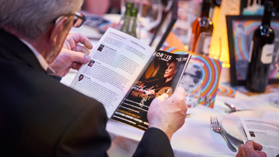 A guest reading the Audentior Awards programme