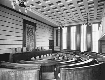 A black and white photo of the council chamber