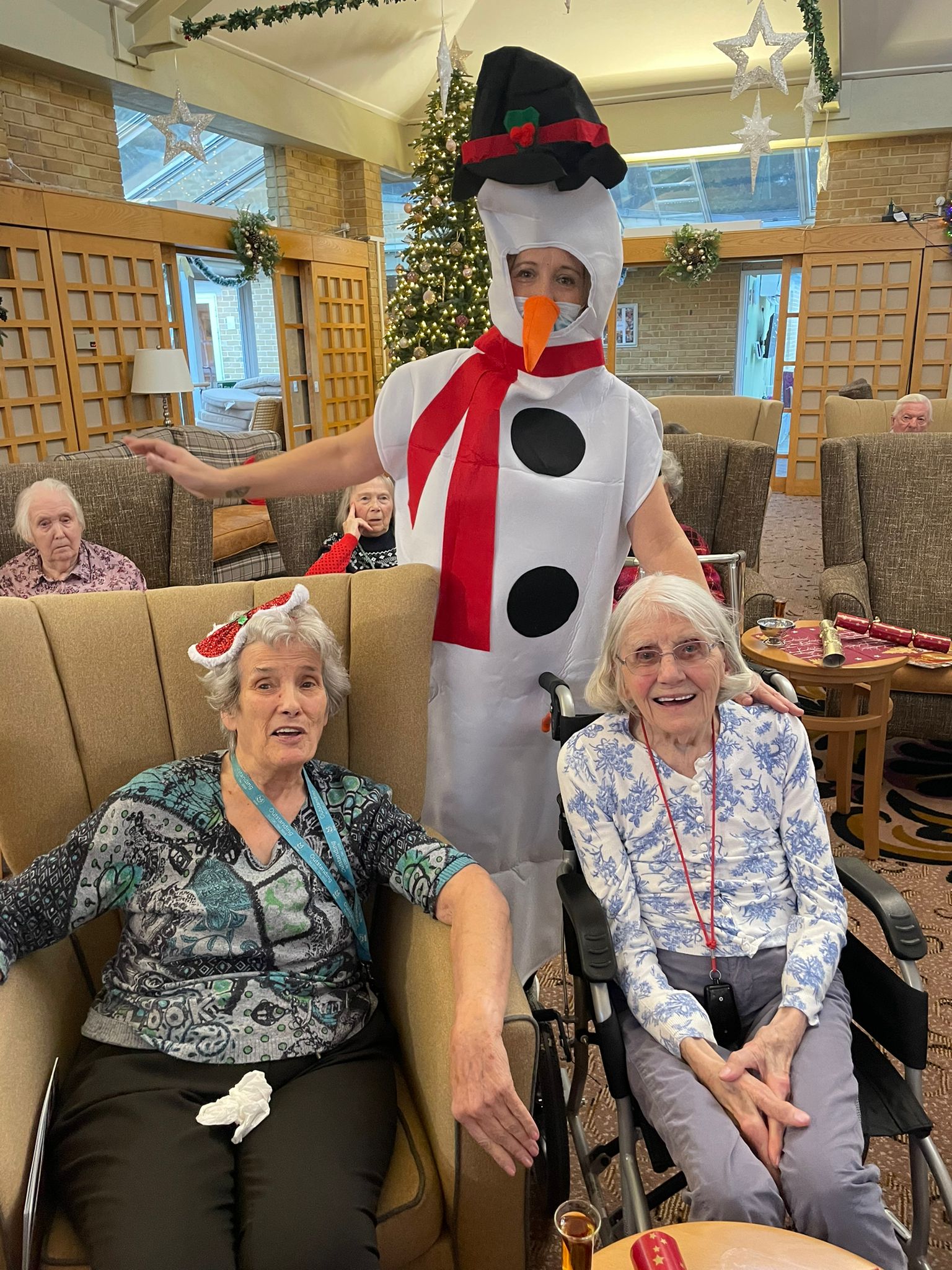 Photo from Care Home showing residents enjoying the ‘Golden Ball Christmas Show’