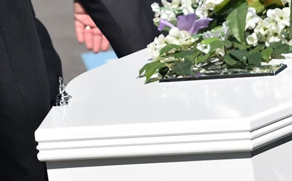 People carrying a casket