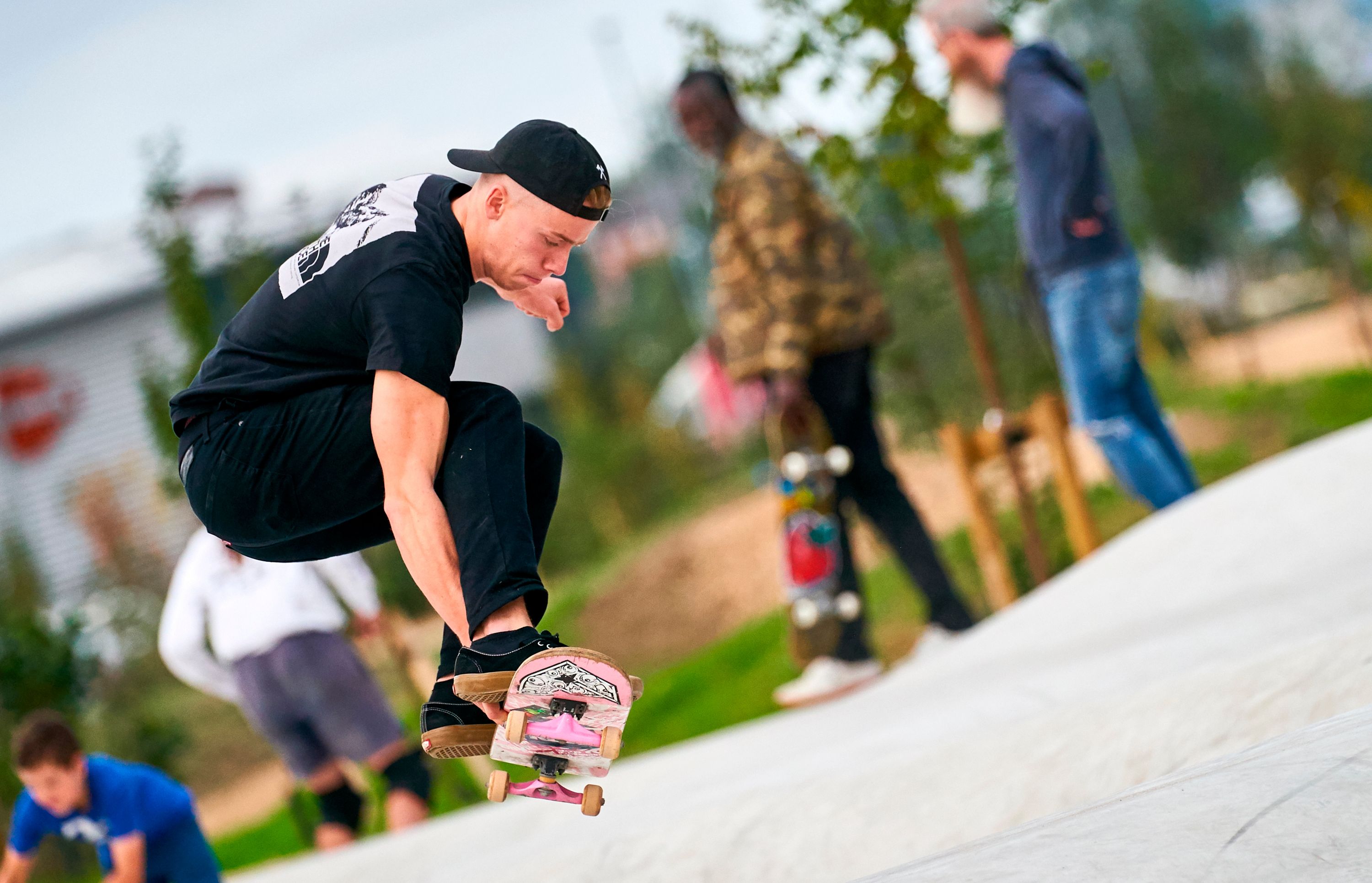 A skater skateboarding in Oxhey Activity Park