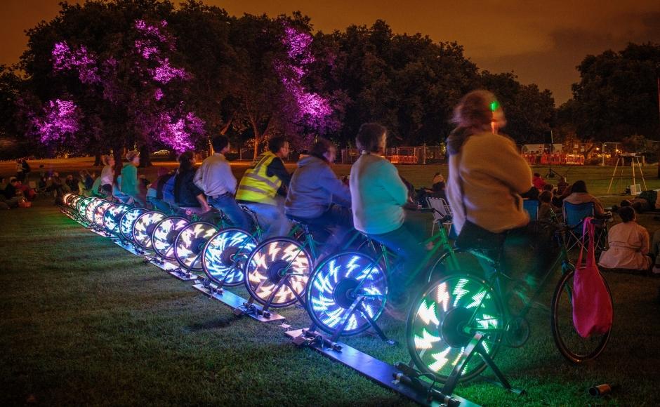 Glowing bikes power the outdoor screen