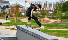 A skateboarder in Oxhey Activity Park
