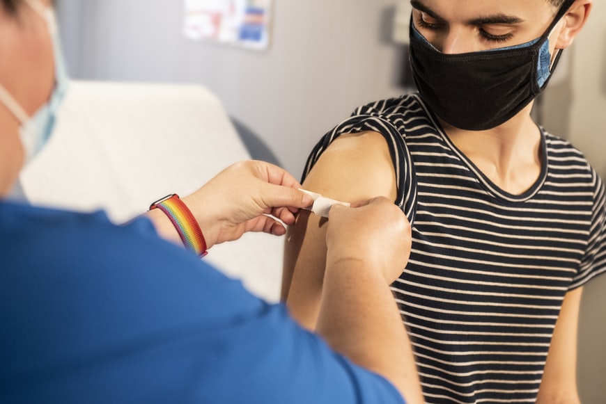 Young woman gets vaccine