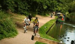 Bike riders in Cassiobury park