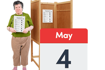 A lady holding the booklet next to a voting station and the date of 4 May