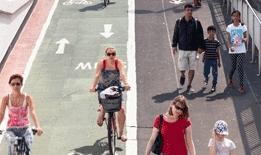 Residents walking through the town