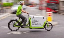 A delivery driver using a bike instead of a car