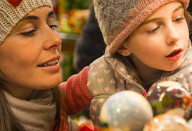 Family at a market lates event