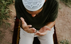 A muslim person praying
