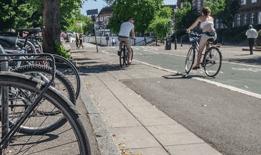 People walking and cycling through the Town