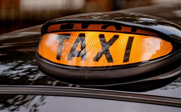 Taxi Sign - photo credit &#039;the blowup&#039; from unsplash